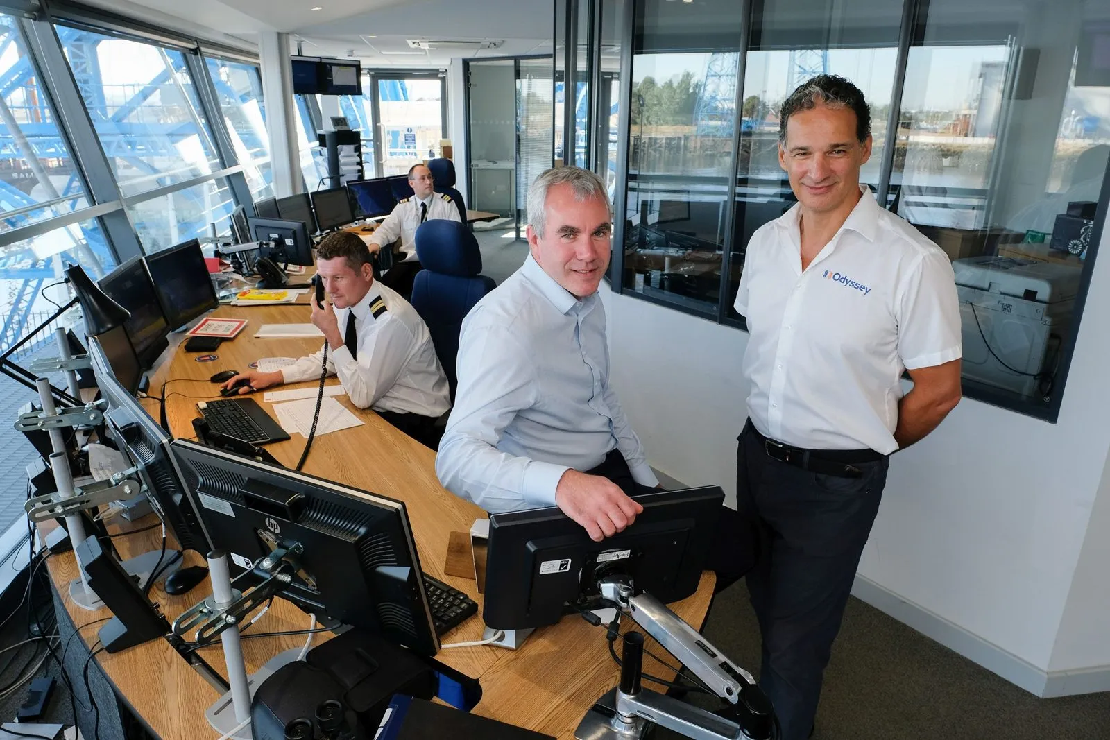 Mike Odysseas of Odyssey (right) in the PD Ports control room with members of the PD Ports team