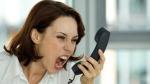 Woman with telephone rage